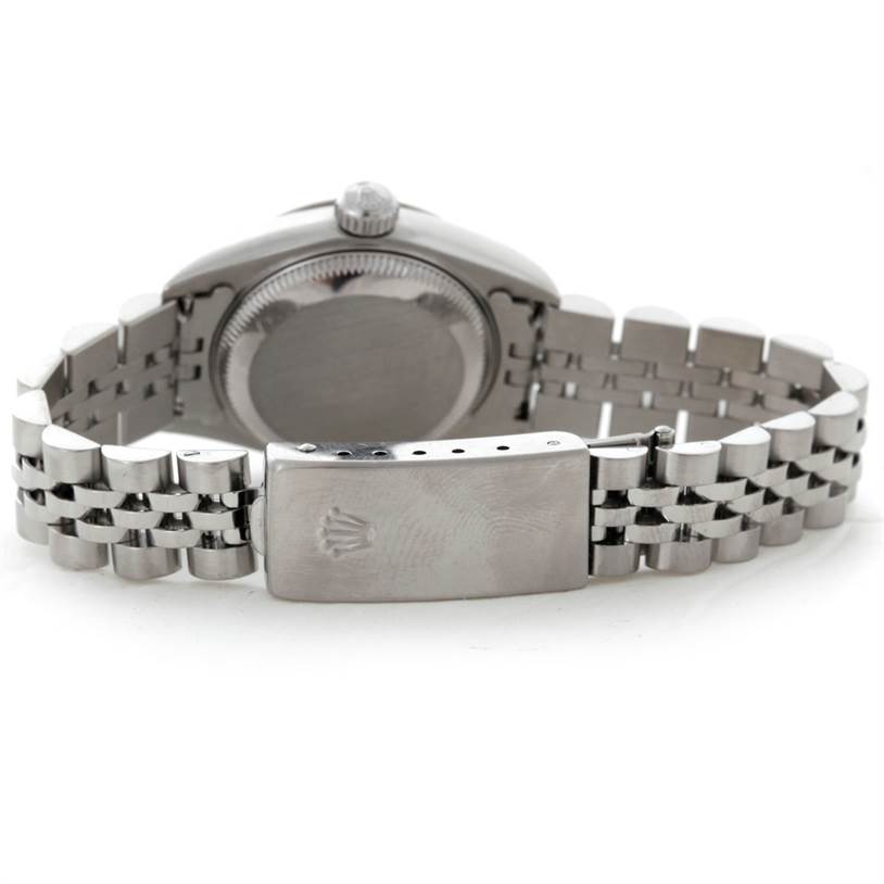 The image shows the back case and bracelet clasp of a Rolex Datejust 79174 Women's Stainless Steel Blue Dial 79174 Women's Stainless Steel Blue Dial watch in a laid-flat position.