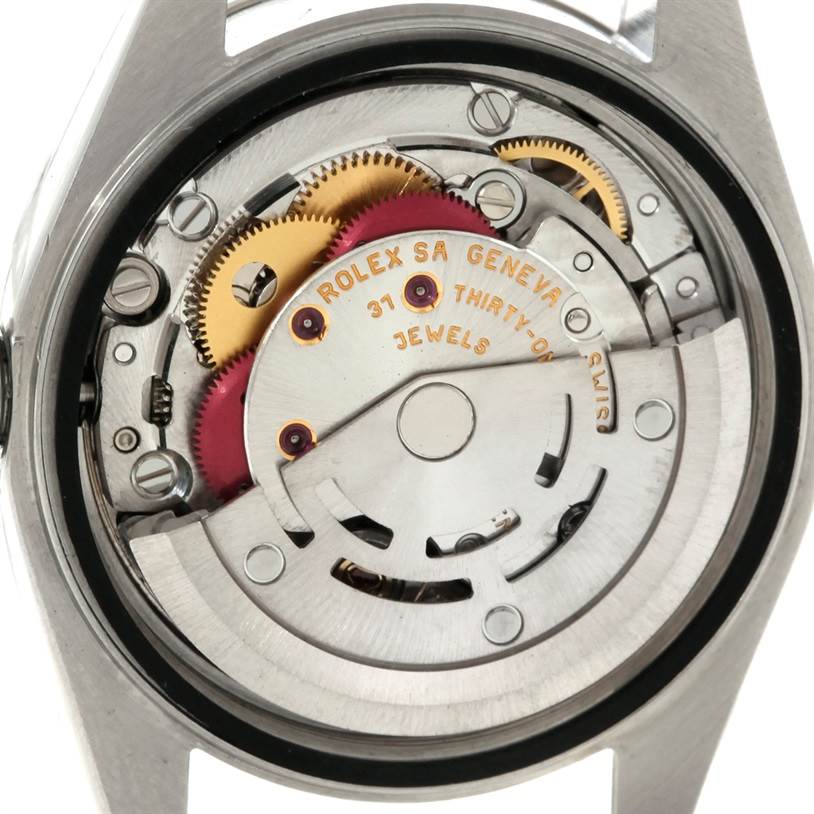 This image shows the internal movement mechanism of a Rolex Datejust 79174 Women's Stainless Steel Blue Dial 79174 Women's Stainless Steel Blue Dial watch from a rear angle.