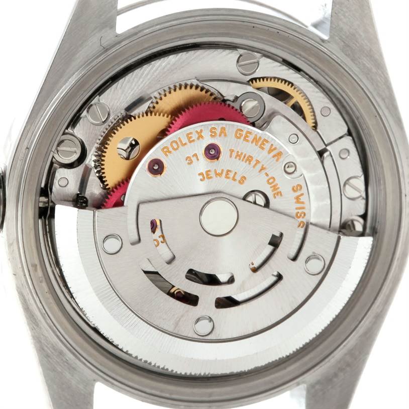 The image shows the back view of a Rolex Datejust 79174 Women's Stainless Steel Silver Dial 79174 Women's Stainless Steel Silver Dial watch revealing its internal mechanical movement.