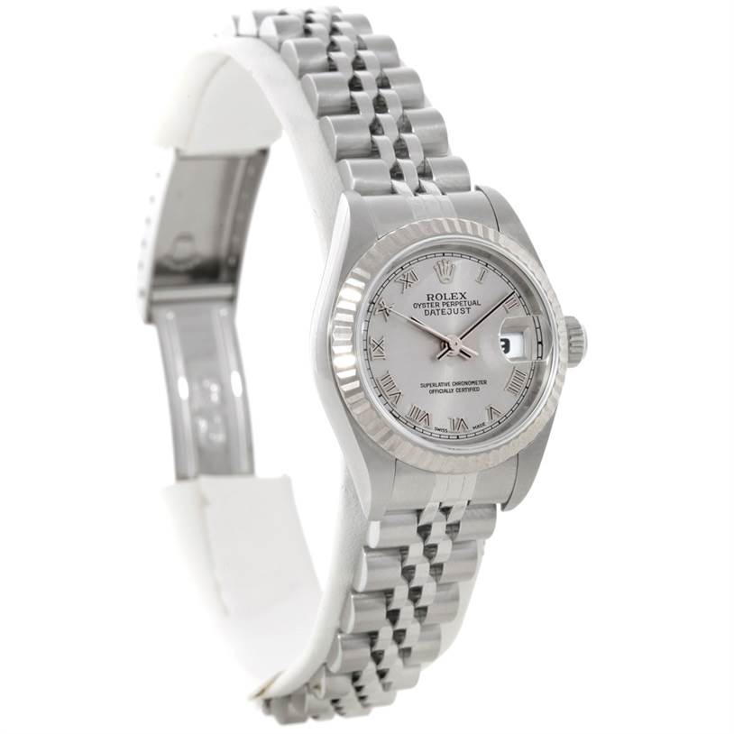 The Rolex Datejust 79174 Women's Stainless Steel Silver Dial 79174 Women's Stainless Steel Silver Dial watch is shown at an angle highlighting the face, fluted bezel, and part of the bracelet.