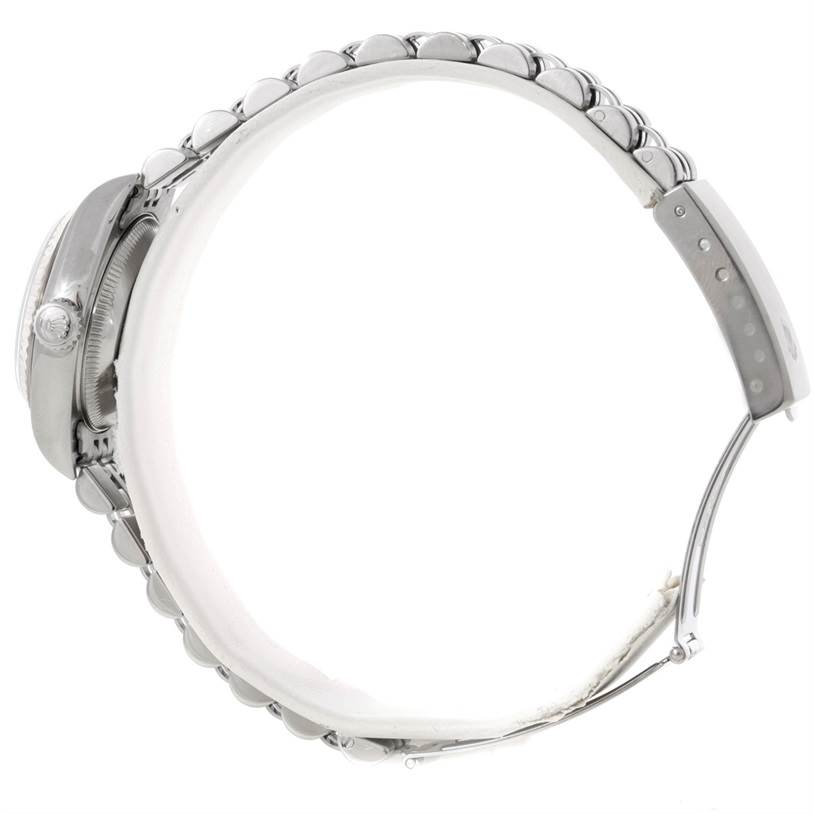 The image shows the side view of a Rolex Datejust 79174 Women's Stainless Steel Silver Dial 79174 Women's Stainless Steel Silver Dial watch, highlighting the watch case, crown, and a section of the bracelet.