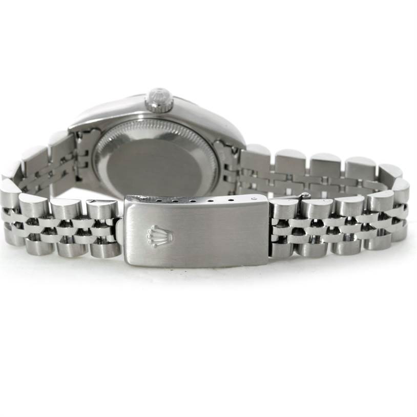 The image shows the back of a Rolex Datejust 79174 Women's Stainless Steel Silver Dial 79174 Women's Stainless Steel Silver Dial watch, highlighting the case back, crown, and Jubilee bracelet with the Rolex clasp.