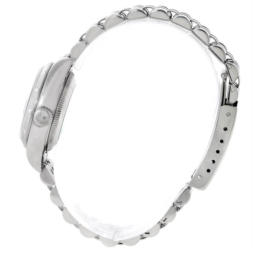 The image shows a side profile of the Rolex Datejust 79190 Women's Stainless Steel Blue Dial 79190 Women's Stainless Steel Blue Dial watch focusing on the case and band.