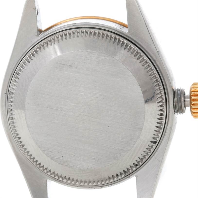 This is a close-up of the back, crown, and lugs of a Rolex Datejust 69173 Women's Stainless Steel Champagne Dial 69173 Women's Stainless Steel Champagne Dial model watch.