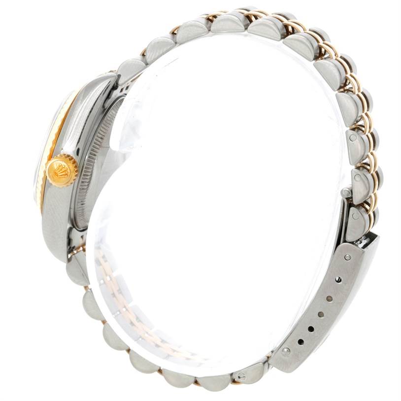 The image shows a side view of a Rolex Datejust 69173 Women's Stainless Steel Champagne Dial 69173 Women's Stainless Steel Champagne Dial watch, focusing on the crown, case, and bracelet.