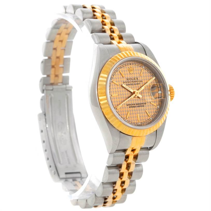 This image shows a Rolex Datejust 69173 Women's Stainless Steel Champagne Dial 69173 Women's Stainless Steel Champagne Dial watch angled from the front-left side, highlighting its face, bezel, and two-tone bracelet.