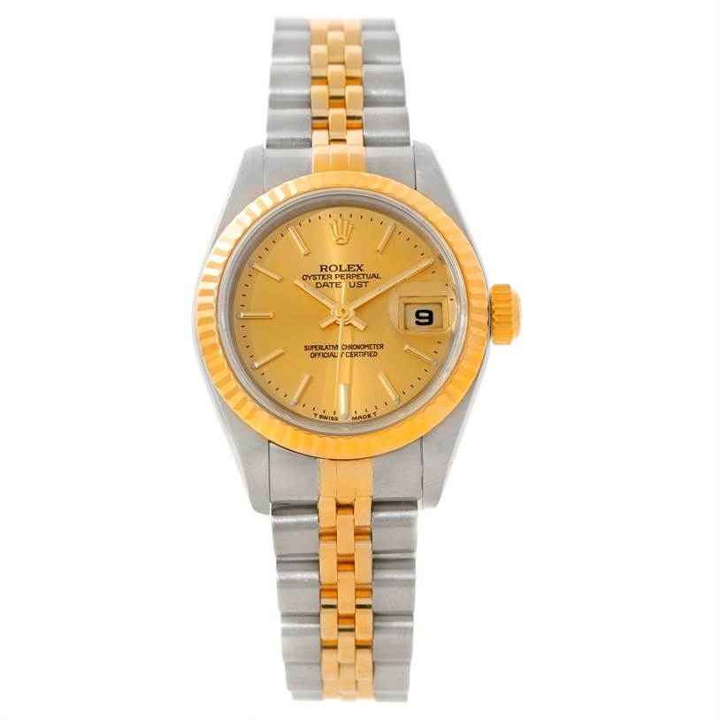 The Rolex Datejust 79173 Women's Stainless Steel Champagne Dial 79173 Women's Stainless Steel Champagne Dial watch is shown from a top-down angle, displaying its yellow dial, jubilee bracelet, and date window at 3 o'clock.