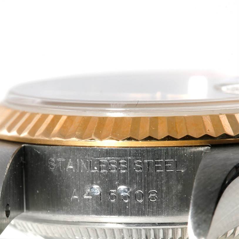 This image shows a side view of the Rolex Datejust 79173 Women's Stainless Steel Champagne Dial 79173 Women's Stainless Steel Champagne Dial model, highlighting the stainless steel case and gold bezel.