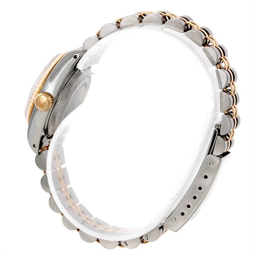 The image shows a side view of a Rolex Datejust 69173 Women's Stainless Steel Champagne Dial 69173 Women's Stainless Steel Champagne Dial watch, highlighting its two-tone bracelet and crown with some clasp details.