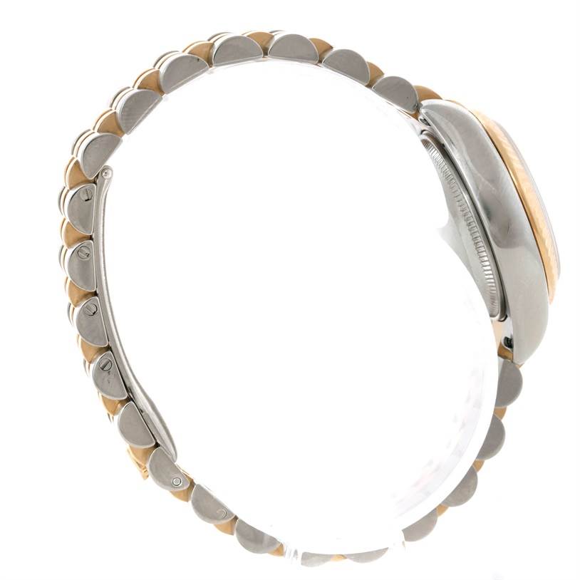 The image shows the side view of a Rolex Datejust 179173 Women's Steel and Gold (two tone) Mother of Pearl Dial 179173 Women's Steel and Gold (two tone) Mother of Pearl Dial watch, highlighting its bracelet and case.