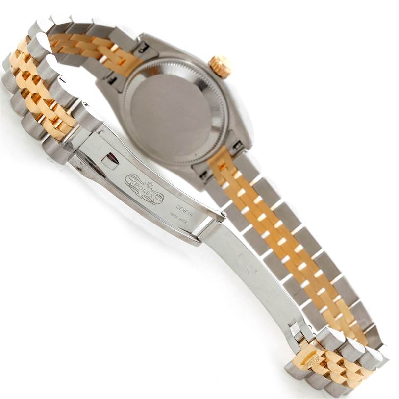 The image shows the case back and the bracelet with the clasp of a Rolex Datejust 179173 Women's Steel and Gold (two tone) Mother of Pearl Dial 179173 Women's Steel and Gold (two tone) Mother of Pearl Dial watch.