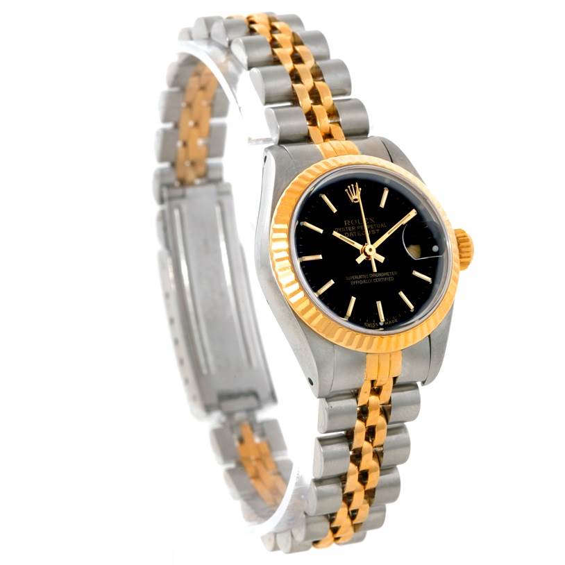 The image shows a side angle of a Rolex Datejust 69173 Women
s Stainless Steel Black Dial 69173 Women
s Stainless Steel Black Dial watch, showcasing the face, bezel, and two-tone bracelet.