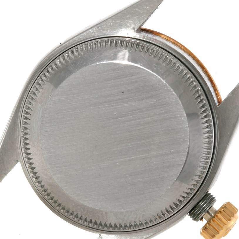 This image shows the back case and crown of a Rolex Datejust 69173 Women's Stainless Steel Silver Dial 69173 Women's Stainless Steel Silver Dial watch from a top-down angle.