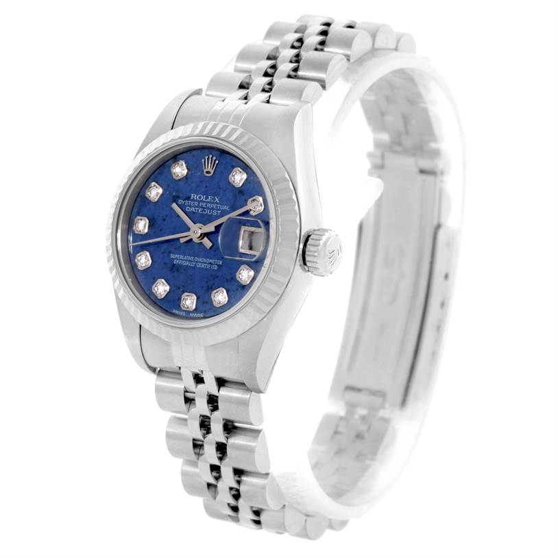 The image shows a Rolex Datejust 79174 Women's Stainless Steel Blue Dial 79174 Women's Stainless Steel Blue Dial watch from an oblique angle, highlighting the face, crown, and part of the bracelet.