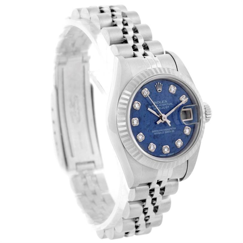 The Rolex Datejust 79174 Women's Stainless Steel Blue Dial 79174 Women's Stainless Steel Blue Dial watch is shown at a slight angle, highlighting its face, bezel, dial, and part of the bracelet.
