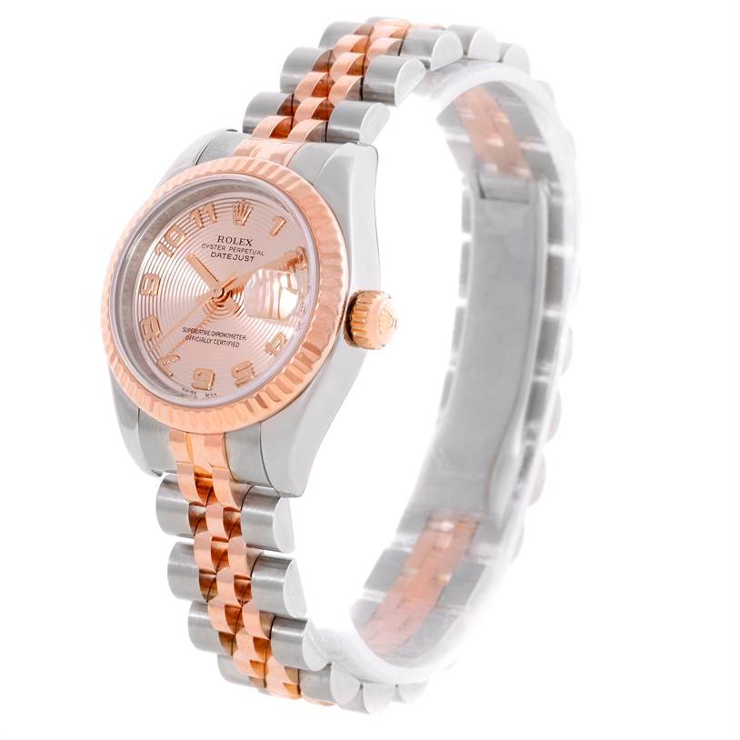 The Rolex Datejust 179171 Women's Steel and Gold (two tone) Pink Dial 179171 Women's Steel and Gold (two tone) Pink Dial watch is shown at a slight angle, highlighting its face, bezel, crown, and two-tone bracelet.