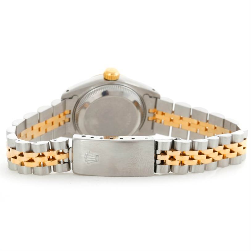 This image shows the back of a Rolex Datejust 69173 Women
s Stainless Steel Beige Dial 69173 Women
s Stainless Steel Beige Dial watch, depicting the case back, crown, and two-tone bracelet.