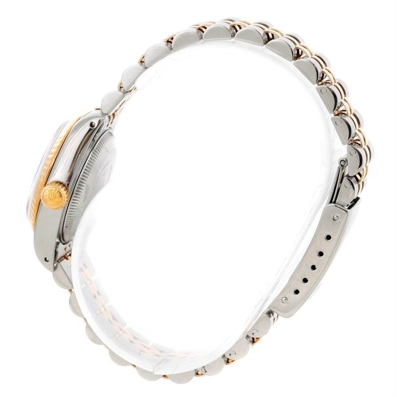 The image shows a side view of a Rolex Datejust 69173 Women's Stainless Steel Champagne Dial 69173 Women's Stainless Steel Champagne Dial watch, highlighting the crown, case, and two-tone bracelet.