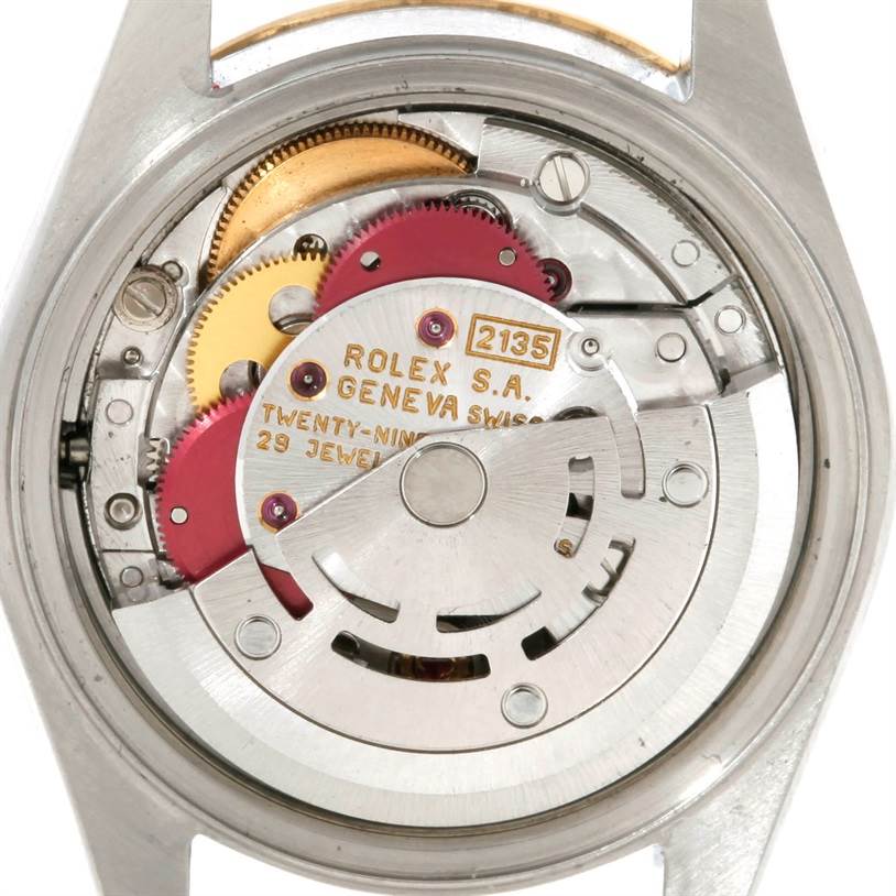 The image shows the back of the Rolex Datejust 69173 Women's Stainless Steel Blue Dial 69173 Women's Stainless Steel Blue Dial watch, revealing its internal movement components and mechanisms.