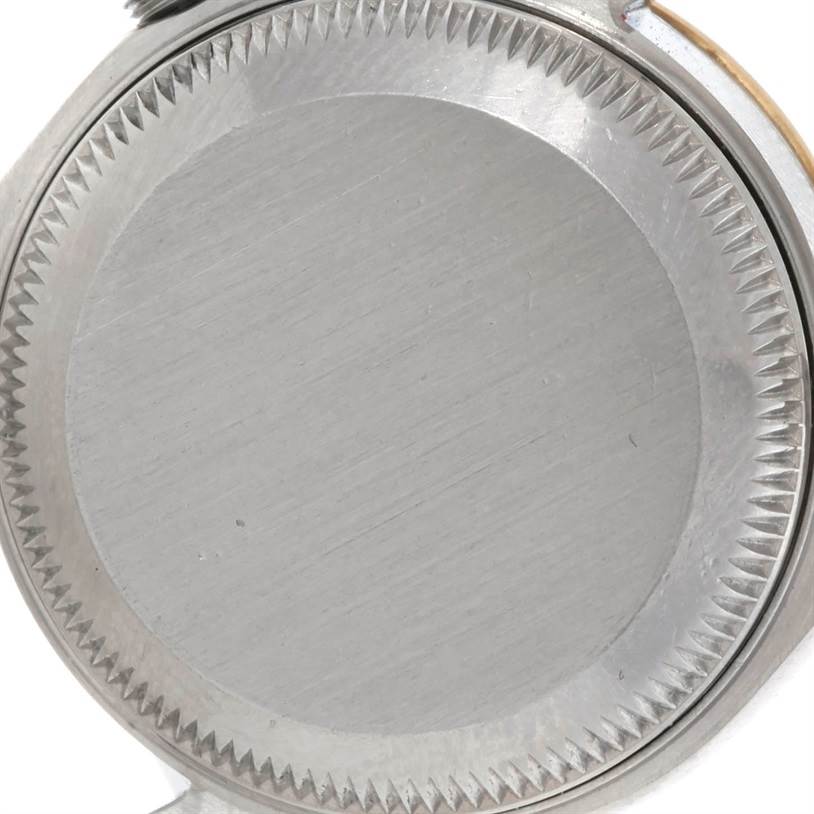 This image shows a close-up view of the case back of a Rolex Datejust 69173 Women's Stainless Steel Blue Dial 69173 Women's Stainless Steel Blue Dial watch.