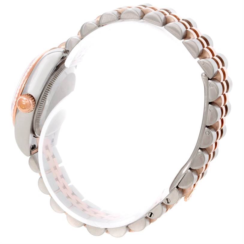 This image shows a side view of a Rolex Datejust 179171 Women's Steel and Gold (two tone) White Dial 179171 Women's Steel and Gold (two tone) White Dial watch, highlighting the bezel, crown, and part of the bracelet.