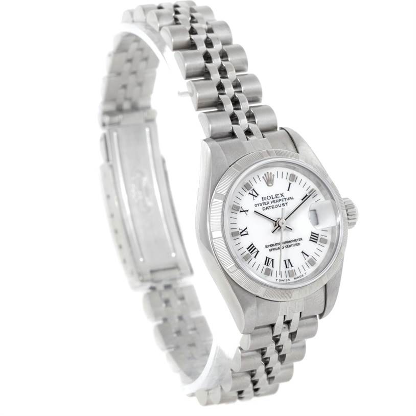 The image shows a Rolex Datejust 79190 Women's Stainless Steel White Dial 79190 Women's Stainless Steel White Dial watch from a slight side angle, prominently displaying the face, bezel, and partially unfolded bracelet.