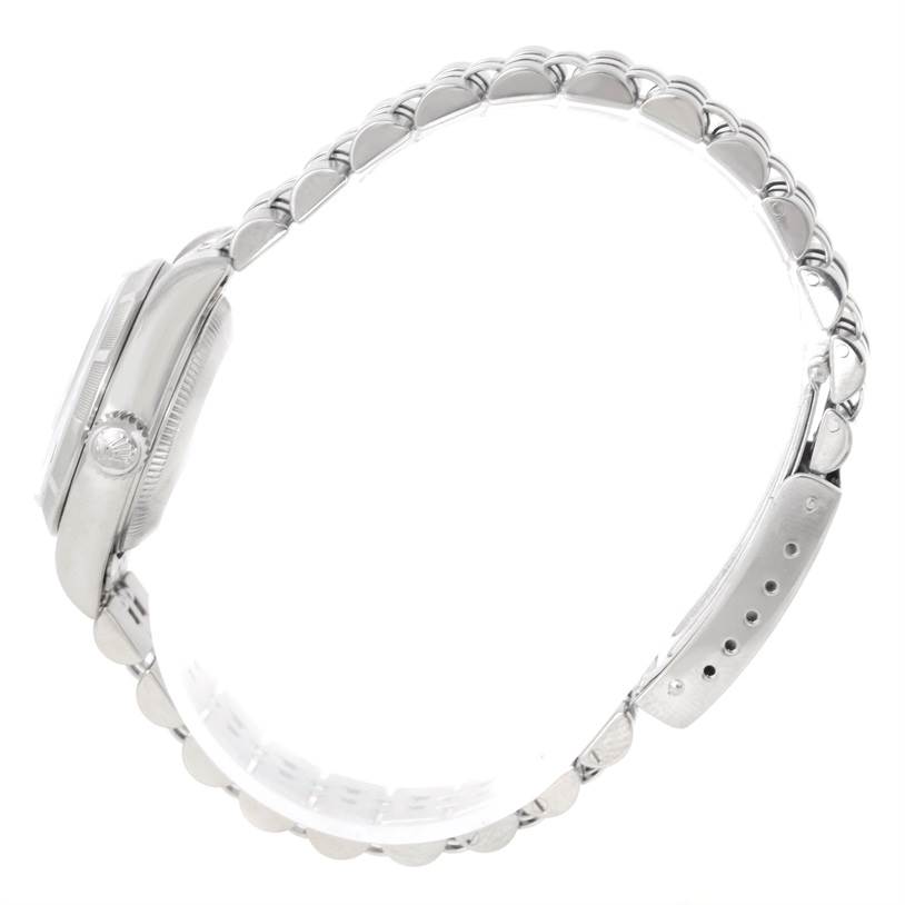 The image shows a side profile of a Rolex Datejust 79190 Women's Stainless Steel White Dial 79190 Women's Stainless Steel White Dial watch, highlighting the bracelet and case.