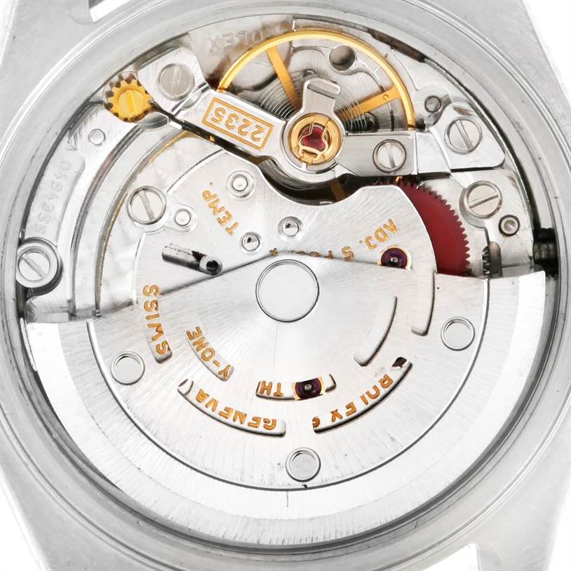 This image shows a close-up view of the movement inside a Rolex Datejust 79174 Women's Stainless Steel Blue Dial 79174 Women's Stainless Steel Blue Dial watch, highlighting the intricate mechanical components.