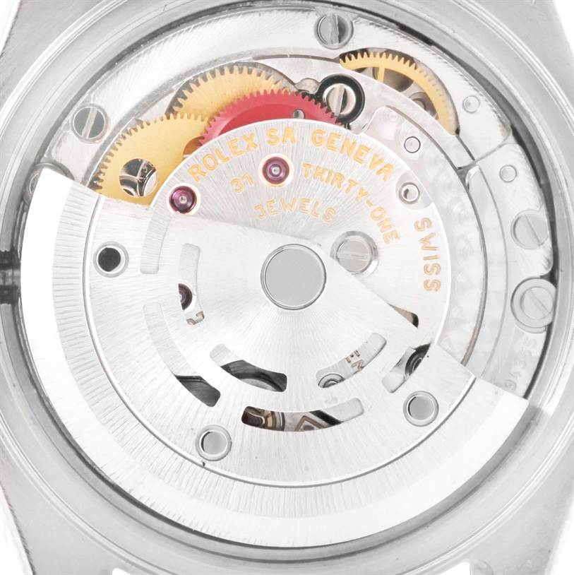 This image shows the intricate movement mechanism of a Rolex Datejust 79174 Women's Stainless Steel Blue Dial 79174 Women's Stainless Steel Blue Dial watch from a back angle.