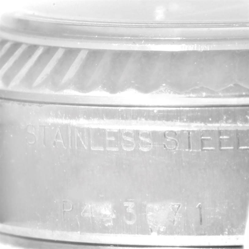 This is a close-up of the Rolex Datejust 79174 Women's Stainless Steel Blue Dial 79174 Women's Stainless Steel Blue Dial's case back, showcasing the stainless steel engraving and model number.