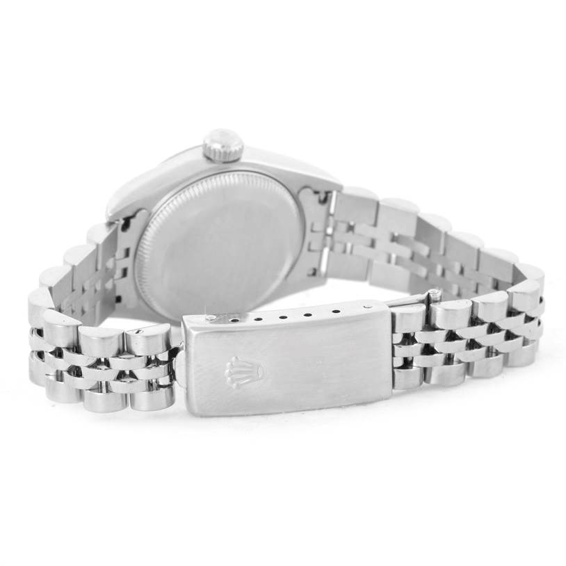 This image shows the back view of the Rolex Datejust 79174 Women's Stainless Steel Blue Dial 79174 Women's Stainless Steel Blue Dial watch, focusing on the case back and partially open Jubilee bracelet clasp.