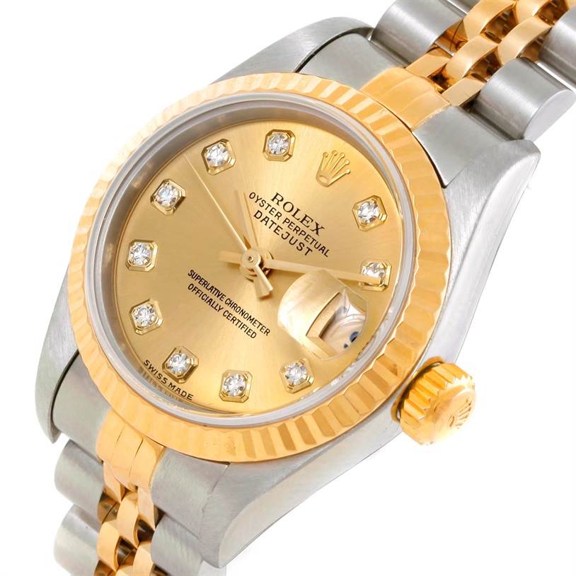 The image shows a Rolex Datejust 79173 Women's Stainless Steel Champagne Dial 79173 Women's Stainless Steel Champagne Dial watch at an angle highlighting its gold bezel, dial, and two-tone bracelet.