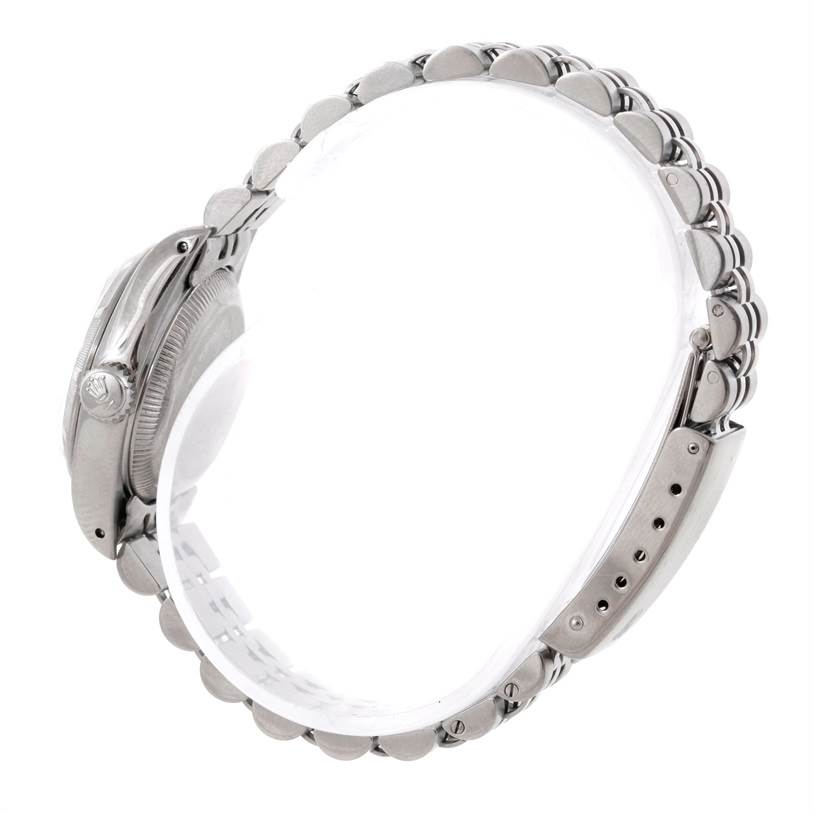 This side-angle view shows the case, crown, and bracelet of a Rolex Datejust 69190 Women's Stainless Steel Pink Dial 69190 Women's Stainless Steel Pink Dial watch.