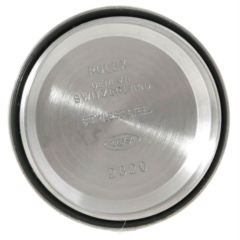 The image shows the inside of a stainless steel case back for a Rolex Datejust 179173 Women's Steel and Gold (two tone) Mother of Pearl Dial 179173 Women's Steel and Gold (two tone) Mother of Pearl Dial watch, displaying brand and model engravings.