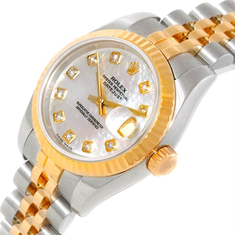 The Rolex Datejust 179173 Women's Steel and Gold (two tone) Mother of Pearl Dial 179173 Women's Steel and Gold (two tone) Mother of Pearl Dial watch is shown at an angle displaying the dial, fluted bezel, crown, and part of the bracelet.