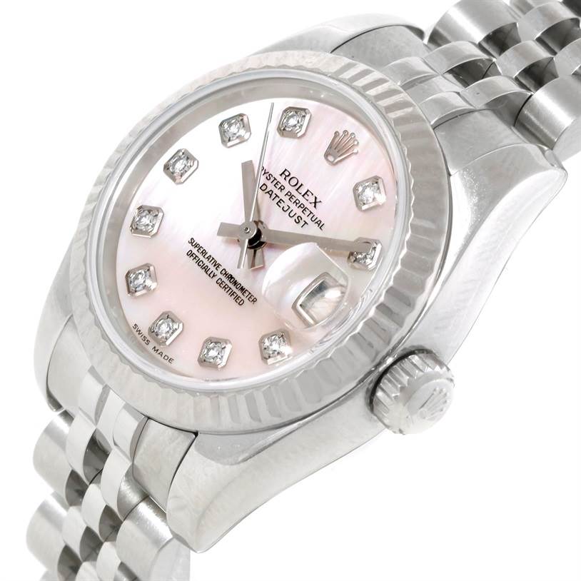 This image shows a close-up of the Rolex Datejust 179174 Women's Stainless Steel Mother of Pearl Dial 179174 Women's Stainless Steel Mother of Pearl Dial watch, highlighting the dial, bezel, crown, and part of the bracelet from a slight side angle.