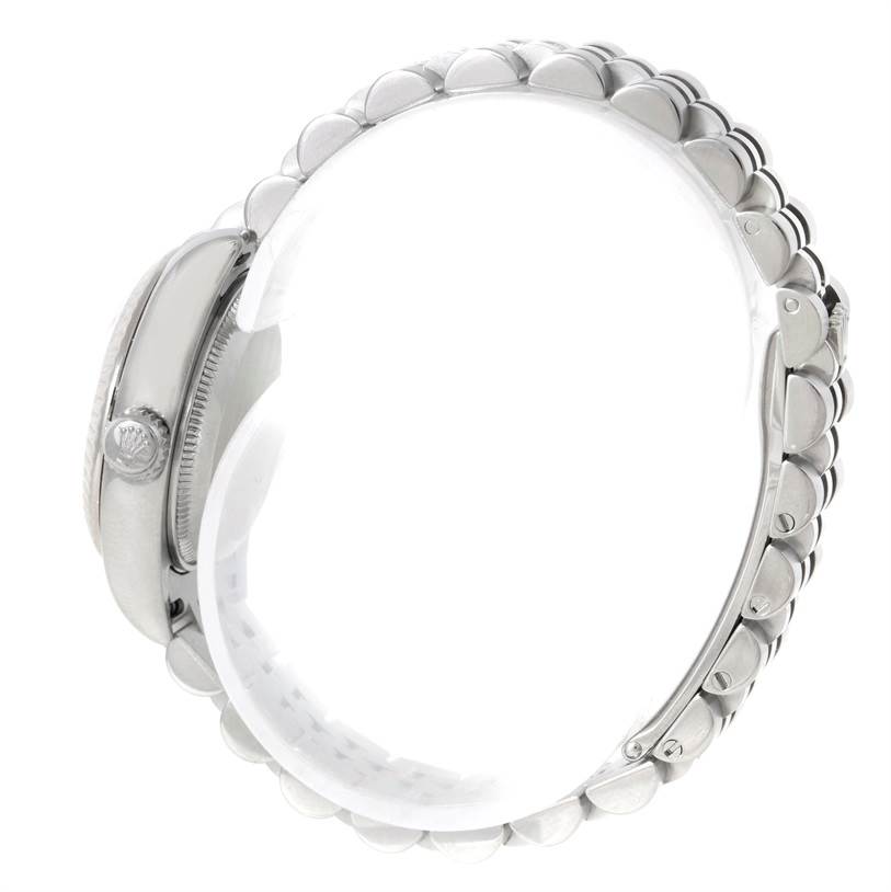 The image shows a side view of a Rolex Datejust 179174 Women's Stainless Steel Mother of Pearl Dial 179174 Women's Stainless Steel Mother of Pearl Dial watch, focusing on the crown and part of the bracelet.