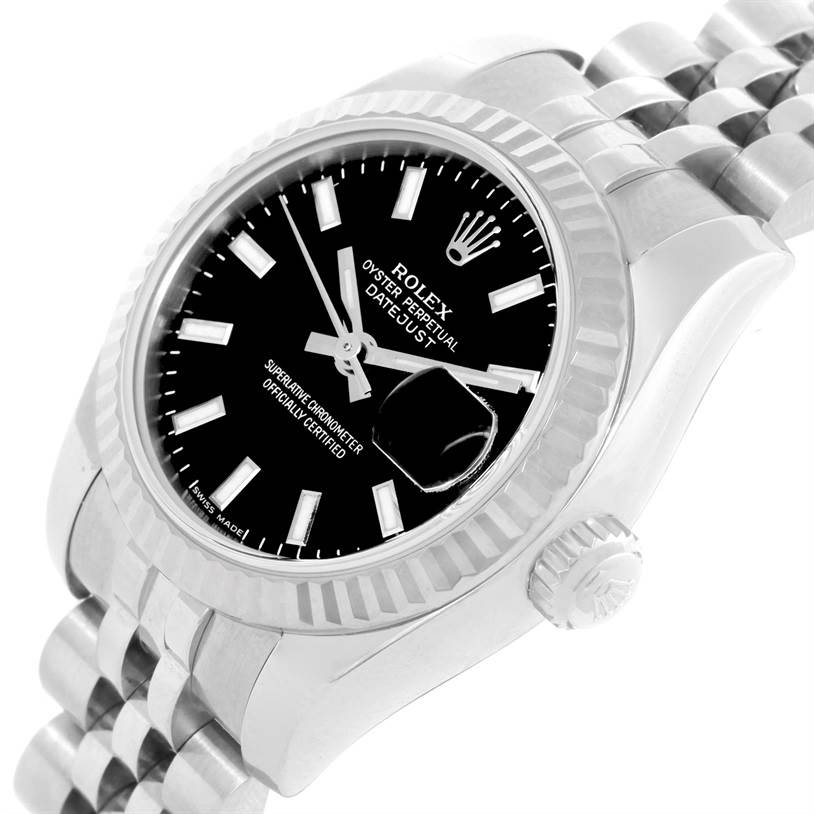 The image shows a close-up of a Rolex Datejust 179174 Women
s Stainless Steel Black Dial 179174 Women
s Stainless Steel Black Dial watch angled from the right side, displaying the dial, bezel, crown, and part of the bracelet.