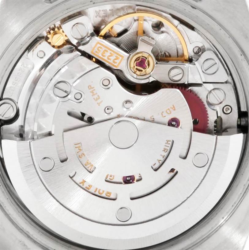 This image shows the internal mechanism and movement parts of a Rolex Datejust 179174 Women
s Stainless Steel Black Dial 179174 Women
s Stainless Steel Black Dial watch from a back angle.