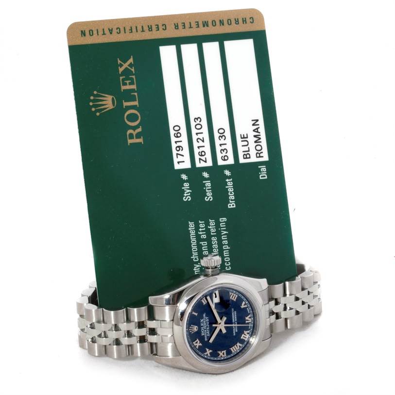This image shows a Rolex Datejust 179160 Women's Stainless Steel Blue Dial 179160 Women's Stainless Steel Blue Dial watch, at an oblique angle featuring the face and bracelet, alongside its certification card.