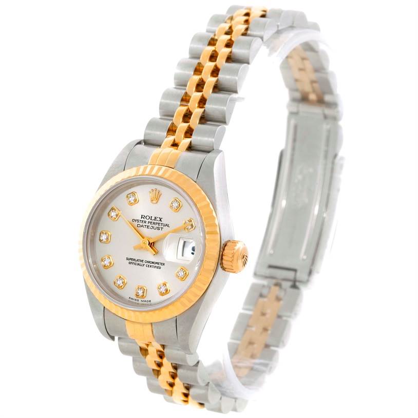 This Rolex Datejust 79173 Women
s Stainless Steel Silver Dial 79173 Women
s Stainless Steel Silver Dial model watch is shown at a slight angle, displaying its face, crown, and two-tone bracelet.