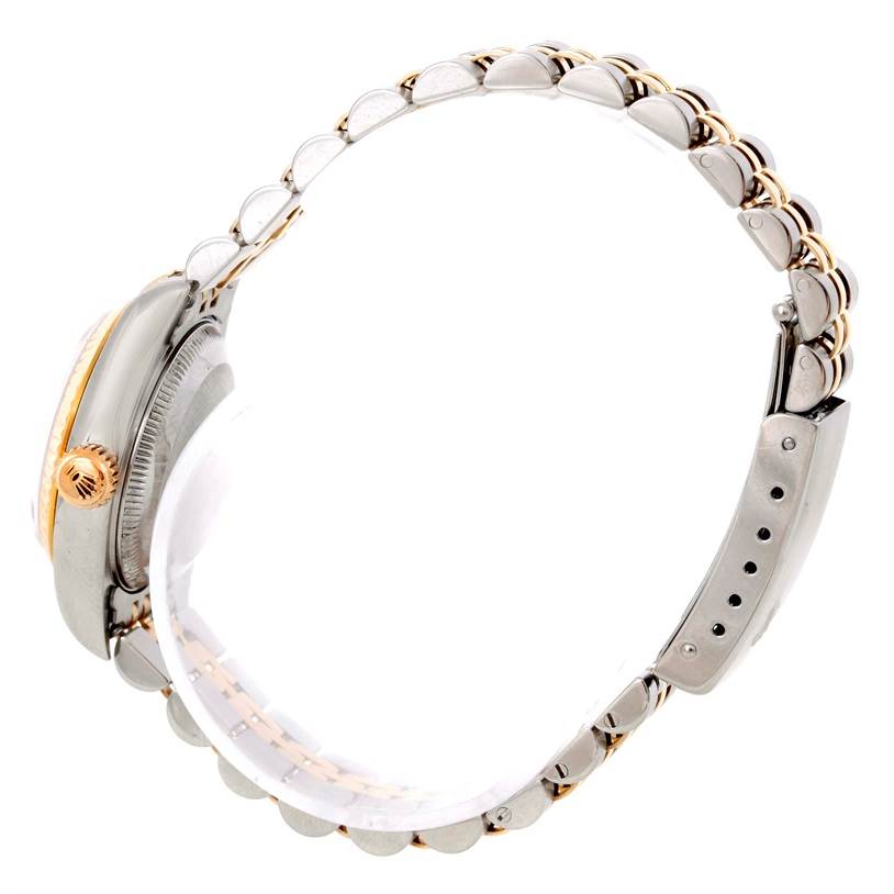 The image shows the side profile and clasp of a Rolex Datejust 79173 Women
s Stainless Steel Silver Dial 79173 Women
s Stainless Steel Silver Dial watch, highlighting its bracelet and crown.