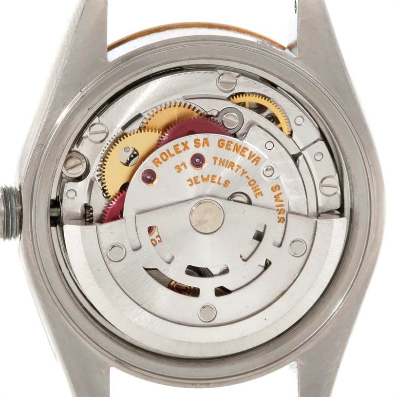 This image shows the internal mechanical movement of the Rolex Datejust 79173 Men
s Stainless Steel Champagne Dial 79173 Men
s Stainless Steel Champagne Dial watch, including gears and jewels, seen from the back case.