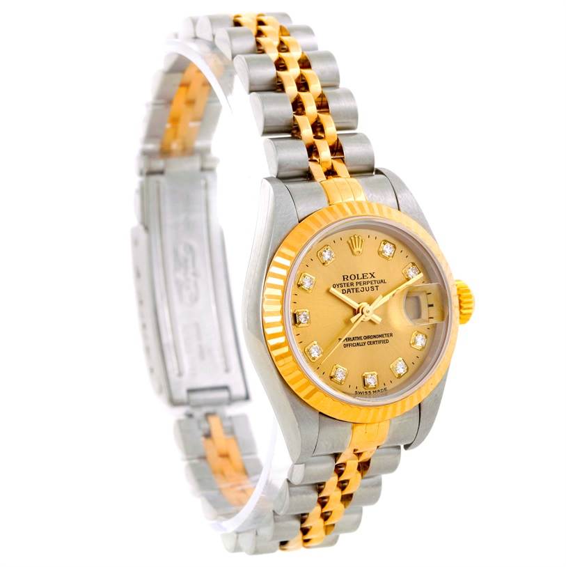 This Rolex Datejust 79173 Men
s Stainless Steel Champagne Dial 79173 Men
s Stainless Steel Champagne Dial watch is shown at an angled front view, highlighting its two-tone bracelet and diamond-accented dial.