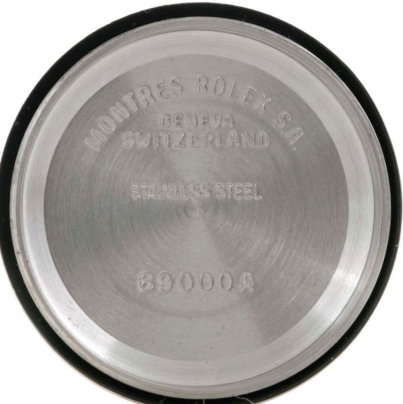 This image shows the inside case back of a Rolex Datejust 69173 Women's Stainless Steel Champagne Dial 69173 Women's Stainless Steel Champagne Dial watch made of stainless steel, with model number 69000A.