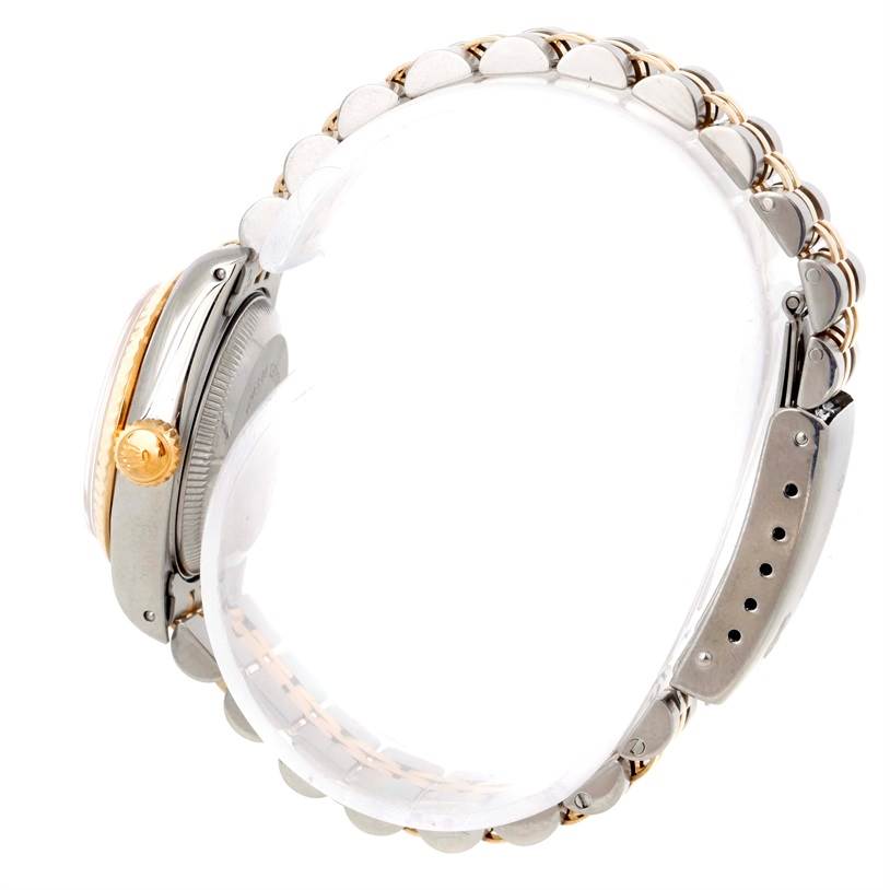 The image shows a side view of a Rolex Datejust 69173 Women's Stainless Steel Champagne Dial 69173 Women's Stainless Steel Champagne Dial watch, highlighting the crown, case, and bracelet.