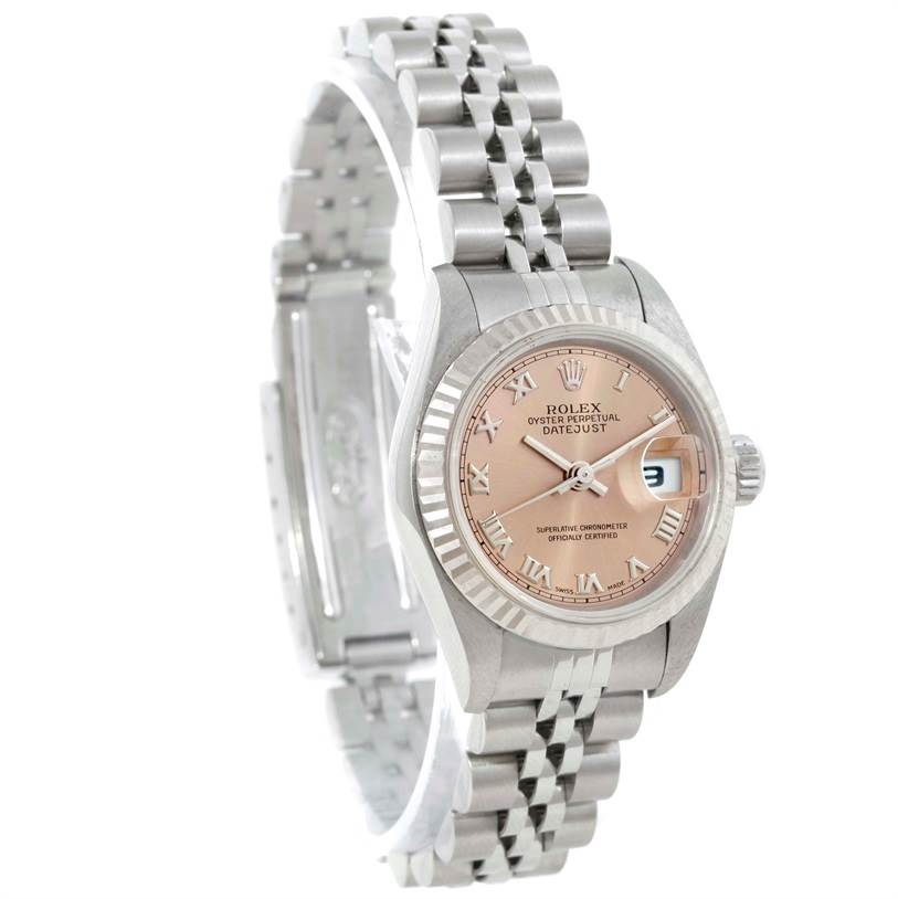 The image shows a Rolex Datejust 79174 Women's Stainless Steel Pink Dial 79174 Women's Stainless Steel Pink Dial watch at an angled front view, highlighting the face, fluted bezel, and Jubilee bracelet.