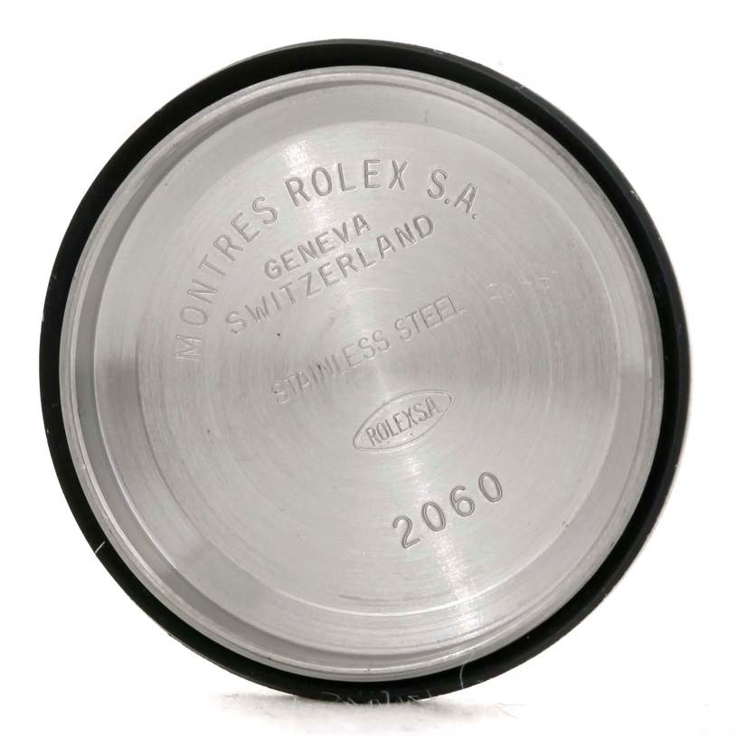 This image shows a close-up of the interior back case of a Rolex Datejust 79174 Women's Stainless Steel Pink Dial 79174 Women's Stainless Steel Pink Dial watch, displaying its engravings and serial numbers.