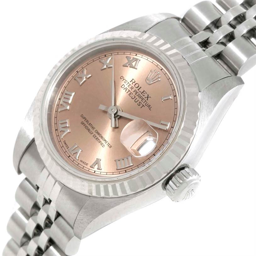 This image shows a Rolex Datejust 79174 Women's Stainless Steel Pink Dial 79174 Women's Stainless Steel Pink Dial watch from an angled close-up, displaying the face, crown, and part of the bracelet.