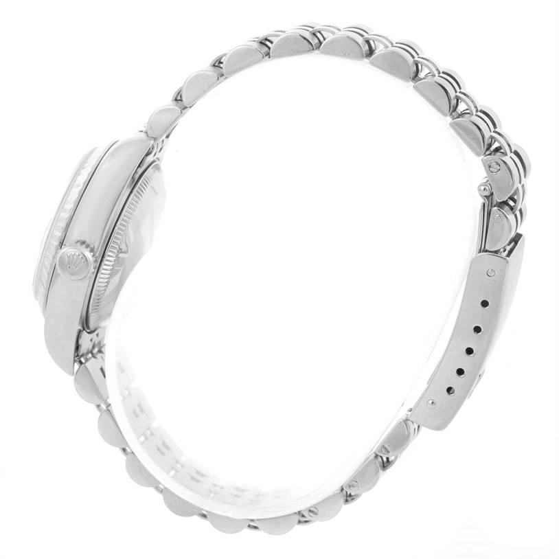 The image shows a side view of the Rolex Datejust 79174 Women's Stainless Steel Black Dial 79174 Women's Stainless Steel Black Dial watch, highlighting the crown, case, and bracelet.